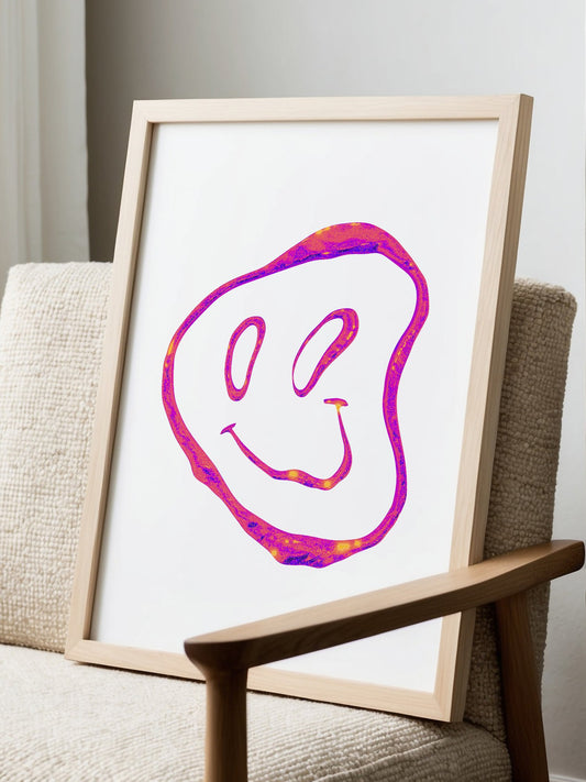 Abstract smiley face wall art with textured magenta and purple brushstrokes, displayed in modern living room setting