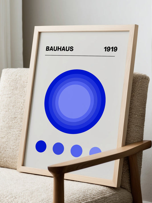 Bauhaus 1919 poster with concentric blue circles on grey background, modernist, displayed in modern living room setting