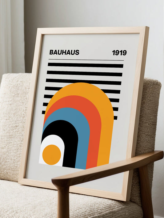 Bauhaus 1919 poster with concentric arches in gold, red, and blue radiating, displayed in modern living room setting