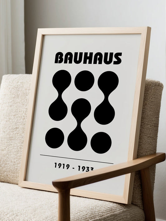 Bauhaus geometric poster featuring nine black circles in grid pattern with, displayed in modern living room setting