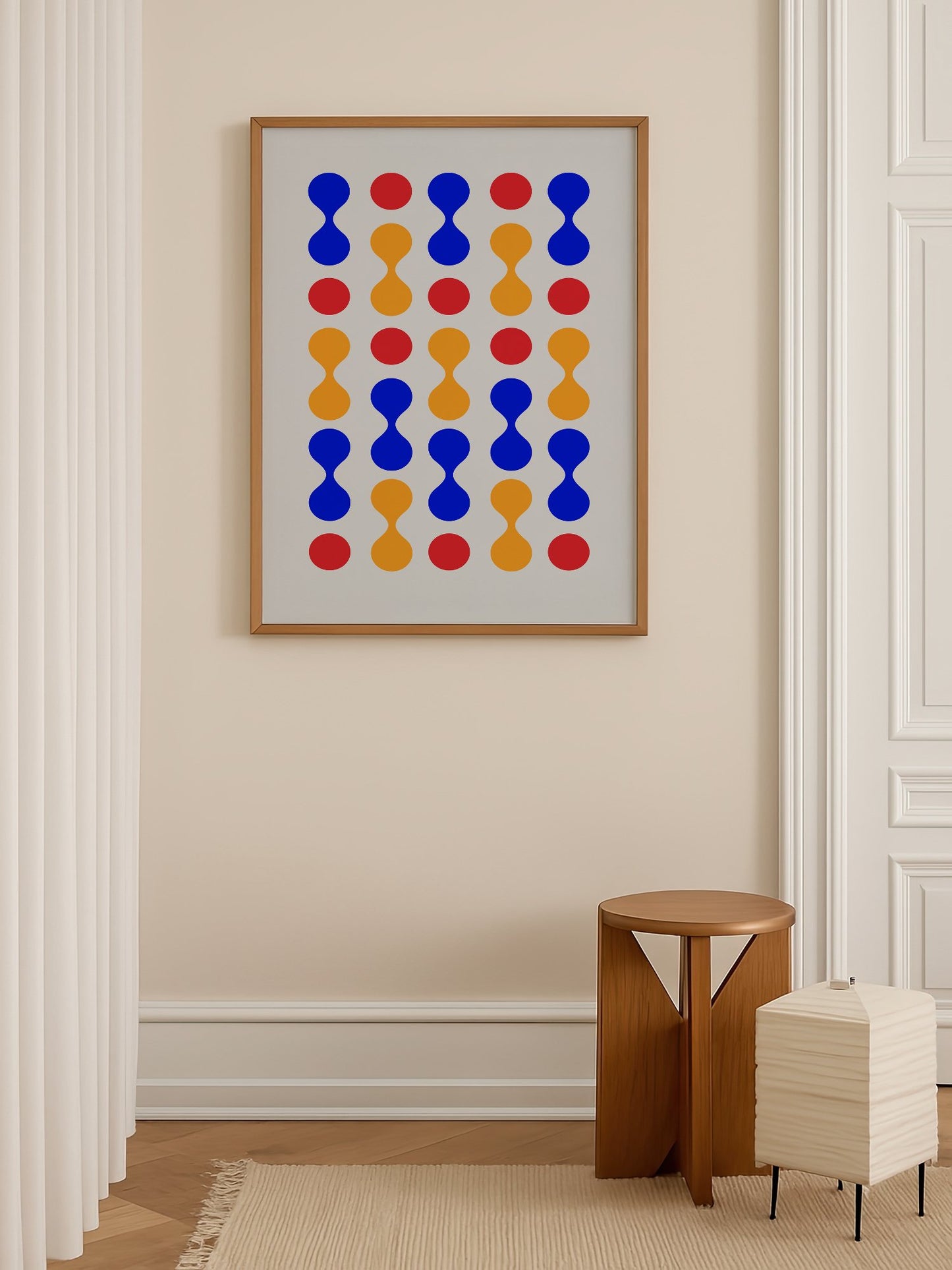 Bauhaus geometric wall art print featuring blue hourglass shapes and red orange, shown in minimalist home office space