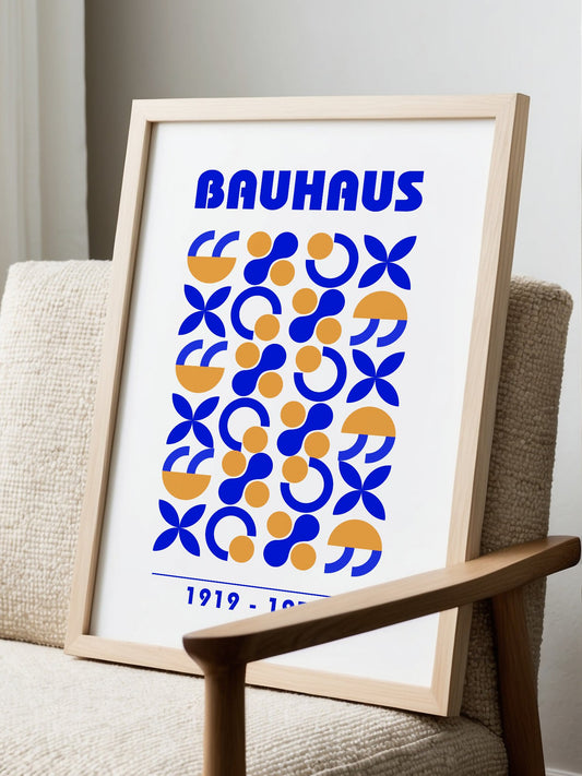 Bauhaus geometric poster with blue and gold arcs and semicircles in grid, displayed in modern living room setting