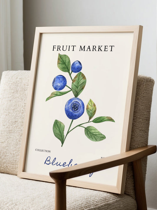 Vintage botanical illustration of blueberries on branch with green leaves, displayed in modern living room setting
