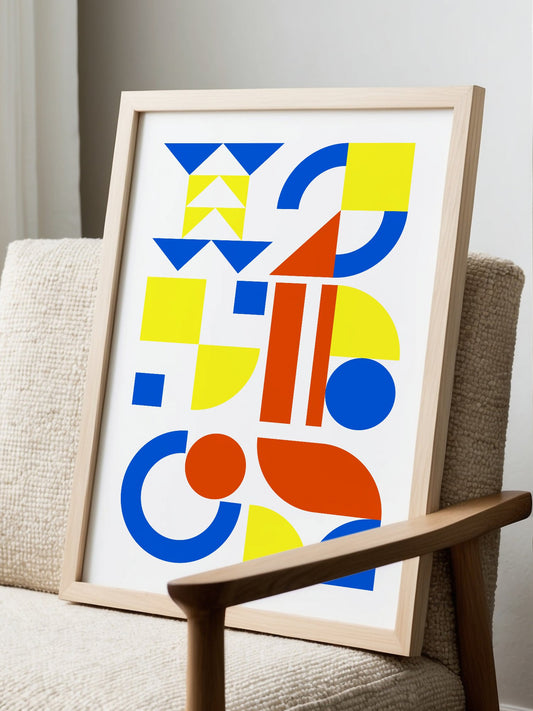 Geometric abstract wall art with blue, yellow and red triangles, circles and, displayed in modern living room setting
