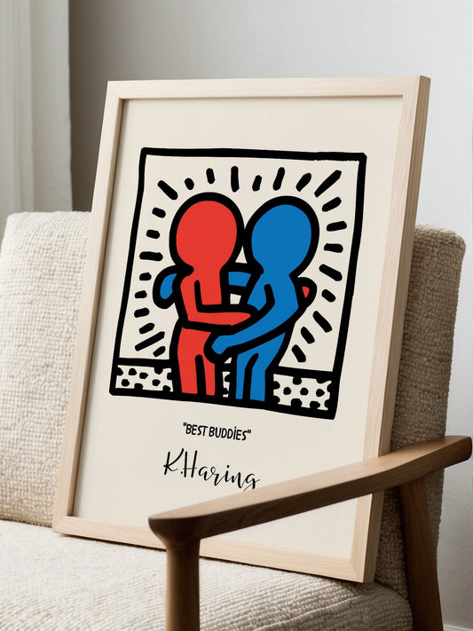 Keith Haring Best Buddies pop art print with red and blue embracing figures, displayed in modern living room setting