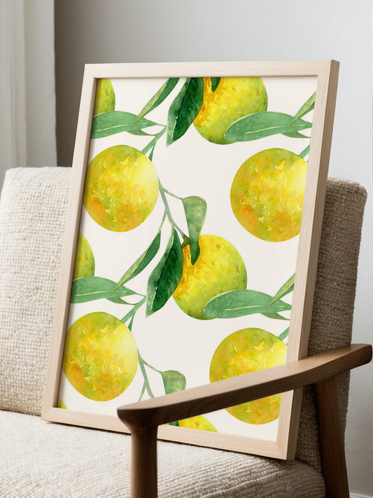 Watercolor botanical print with yellow lemons, green leaves and citrus branches, displayed in modern living room setting