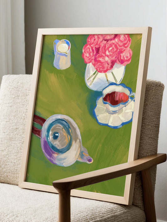 Still life painting of pink roses in glass vase with blue and white tea service, displayed in modern living room setting
