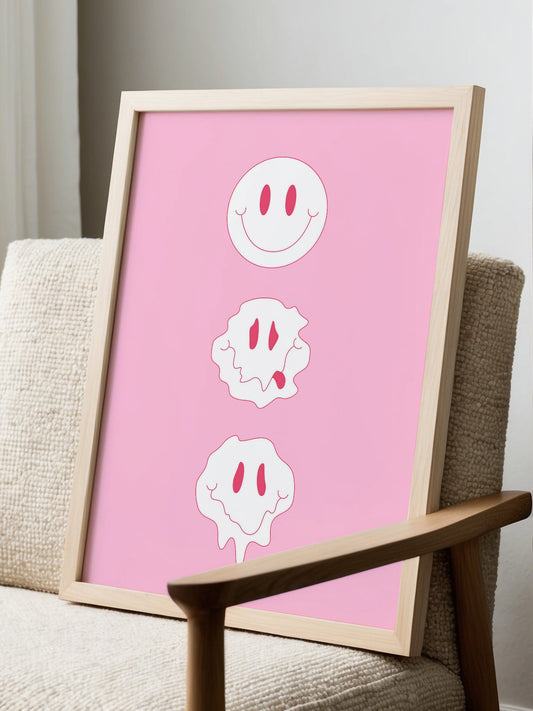 Three smiling blob character faces in minimalist pink line art style, stacked, displayed in modern living room setting