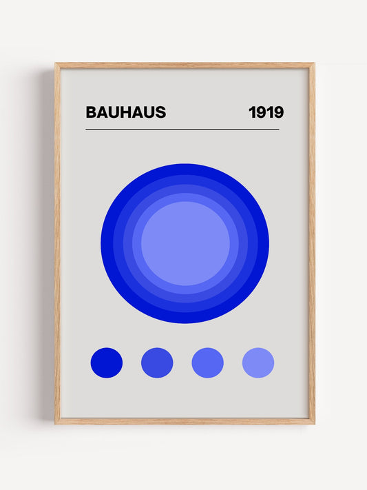 Bauhaus 1919 poster with concentric blue circles on grey background, modernist, close-up showing print texture and color d...
