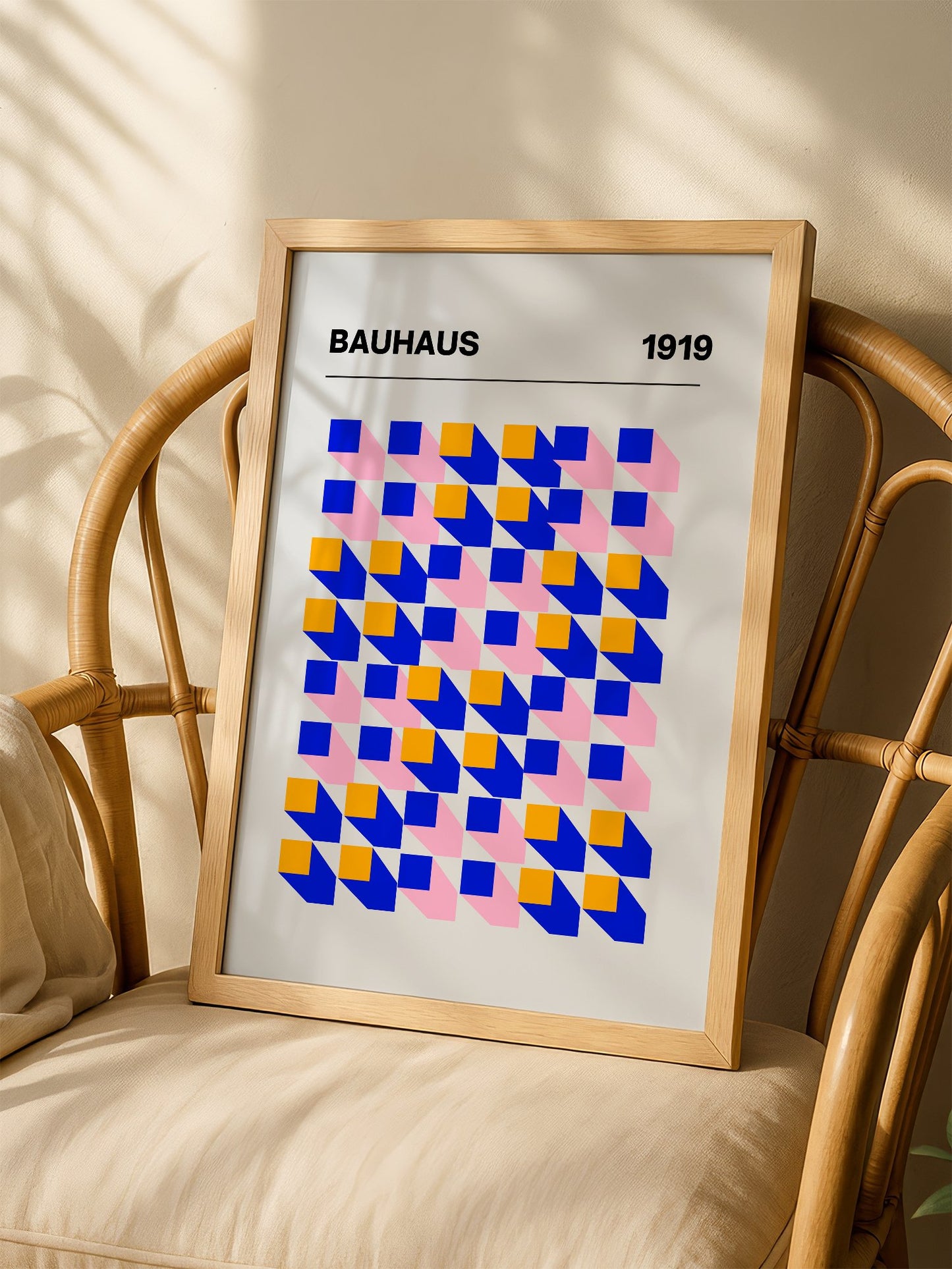Bauhaus 1919 geometric abstract art print with interlocking blue yellow and, shown in minimalist home office space