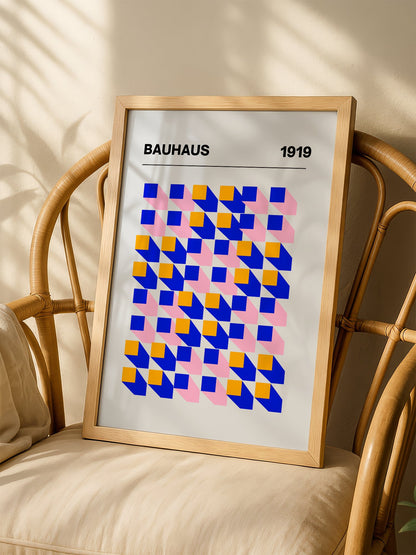 Bauhaus 1919 geometric abstract art print with interlocking blue yellow and, shown in minimalist home office space