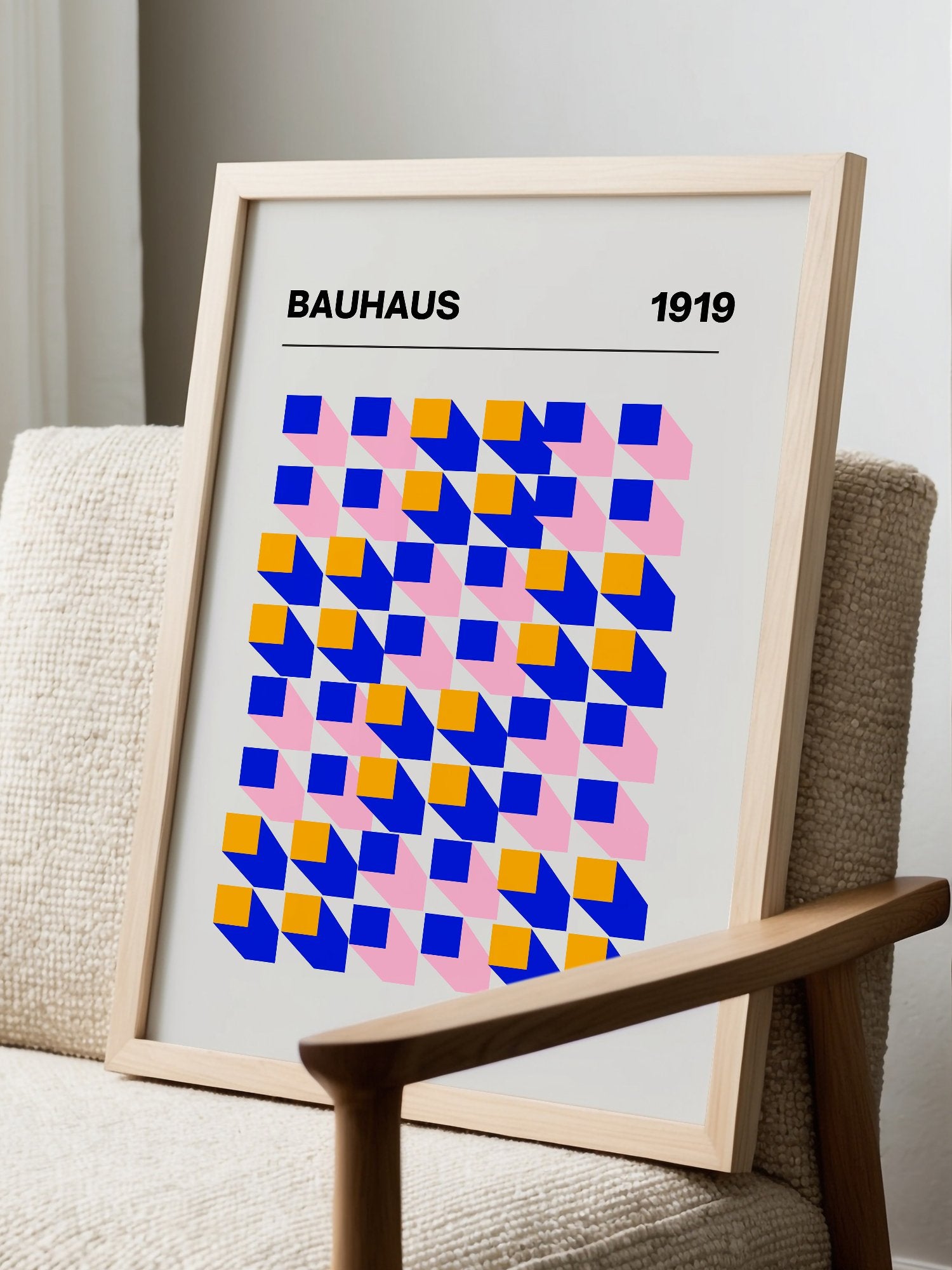 Bauhaus 1919 geometric abstract art print with interlocking blue yellow and, displayed in modern living room setting