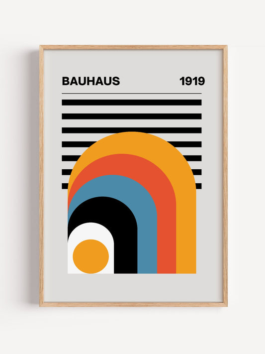 Bauhaus 1919 poster with concentric arches in gold, red, and blue radiating, close-up showing print texture and color detail