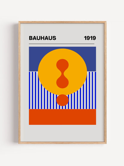 Bauhaus 1919 geometric poster featuring yellow circle with red hourglass shape, close-up showing print texture and color d...