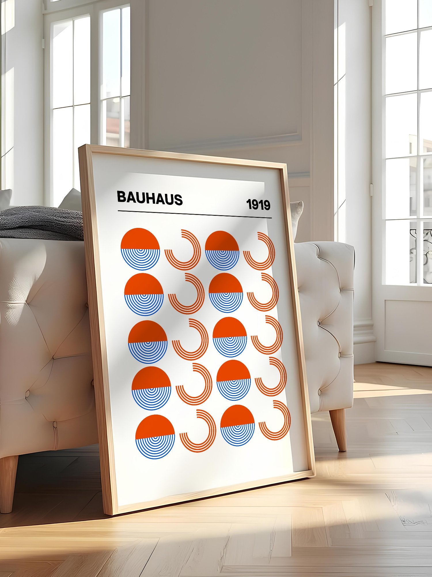 Bauhaus 1919 geometric poster featuring grid pattern of orange and blue, featured in stylish apartment decor