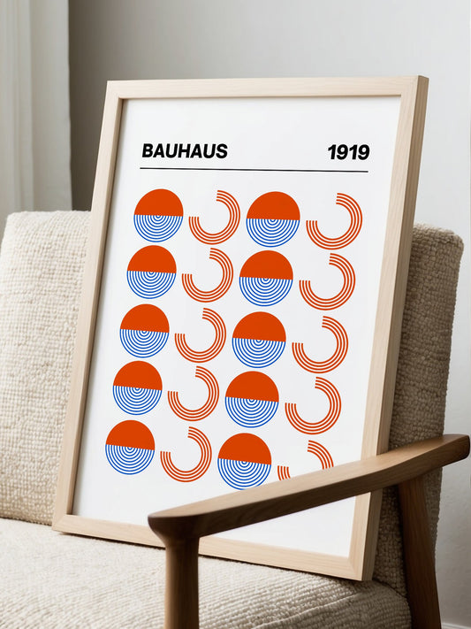 Bauhaus 1919 geometric poster featuring grid pattern of orange and blue, displayed in modern living room setting