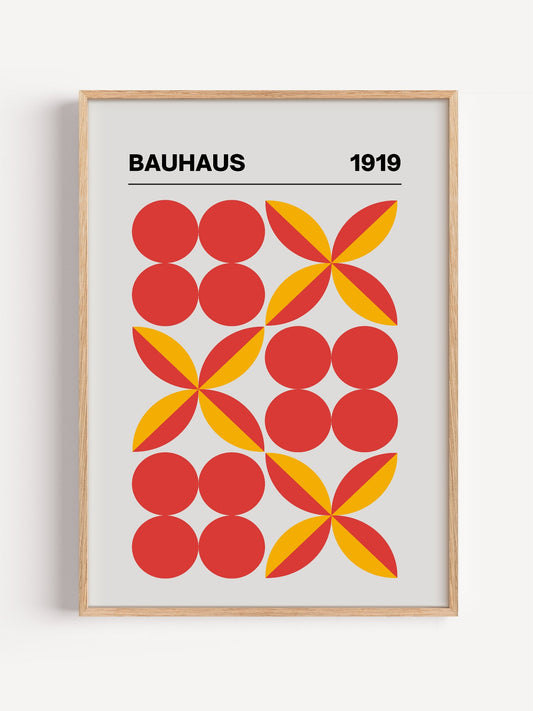 Bauhaus 1919 geometric art print with red circles and yellow pinwheel shapes in, close-up showing print texture and color ...
