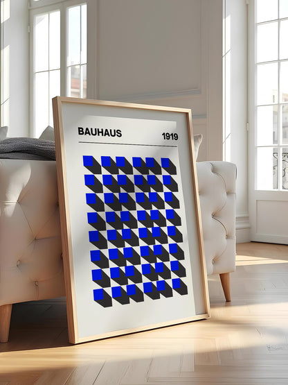 Bauhaus 1919 geometric poster featuring blue isometric cubes arranged in grid, featured in stylish apartment decor
