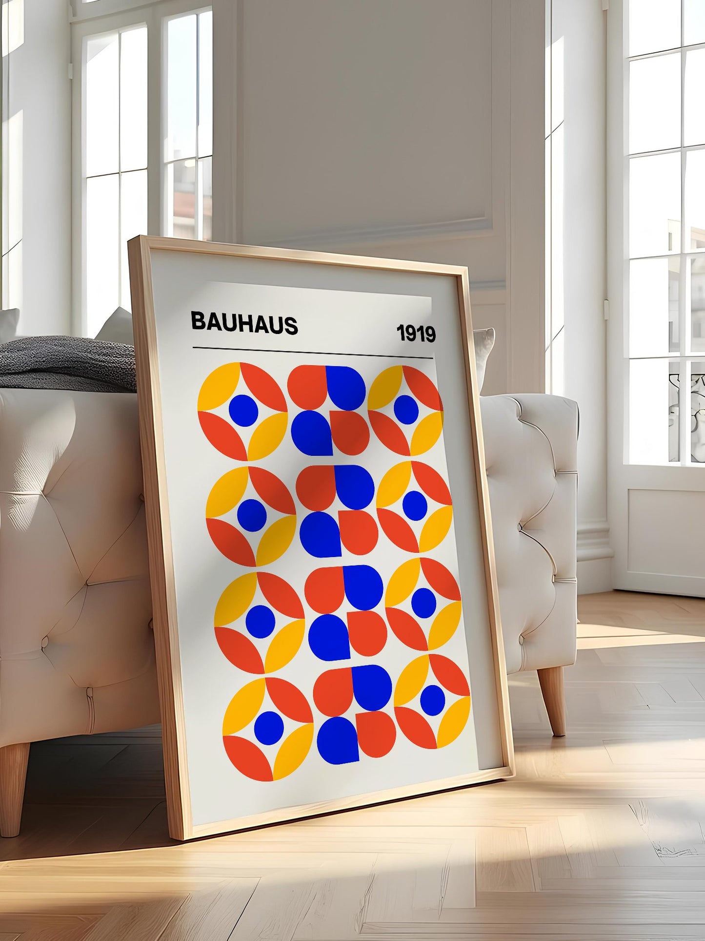 Bauhaus 1919 geometric poster featuring circular medallions in blue red yellow, featured in stylish apartment decor