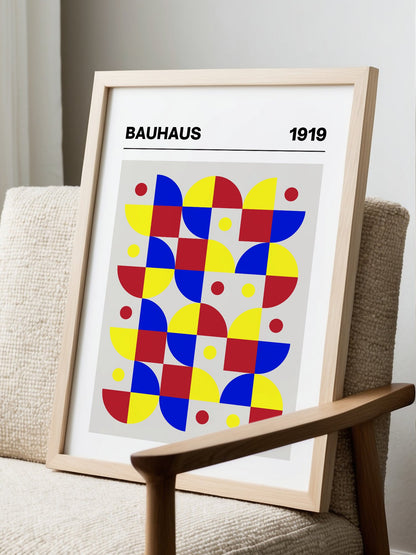 Bauhaus geometric wall art with red blue yellow grid pattern, semicircular, displayed in modern living room setting