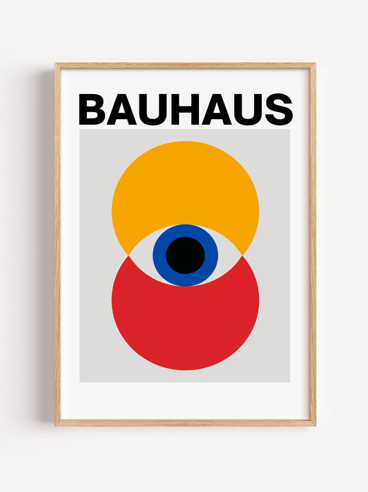 Bauhaus poster with geometric overlapping circles in yellow and red, stylized, close-up showing print texture and color de...