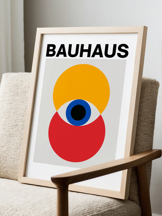 Bauhaus poster with geometric overlapping circles in yellow and red, stylized, displayed in modern living room setting