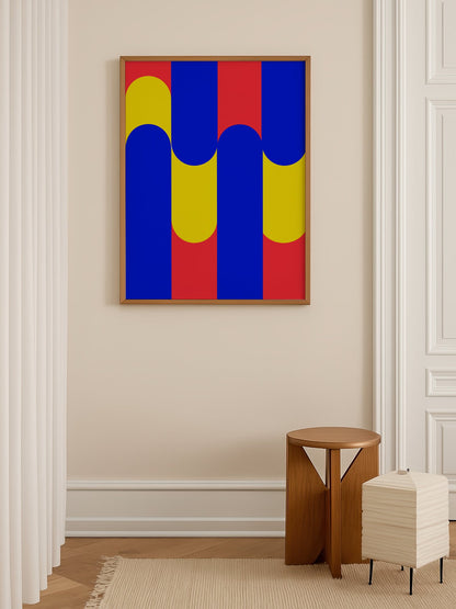 Geometric abstract art print with blue circles on yellow rounded rectangles, shown in minimalist home office space