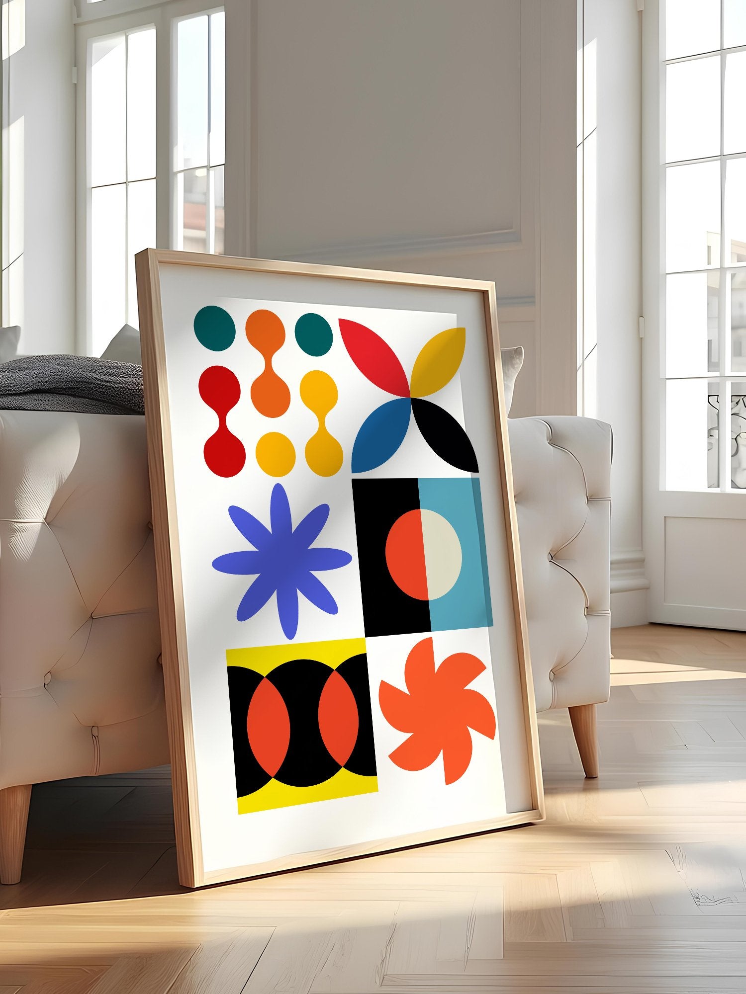 Colourful geometric abstract art print with starbursts, circles and shapes in, featured in stylish apartment decor