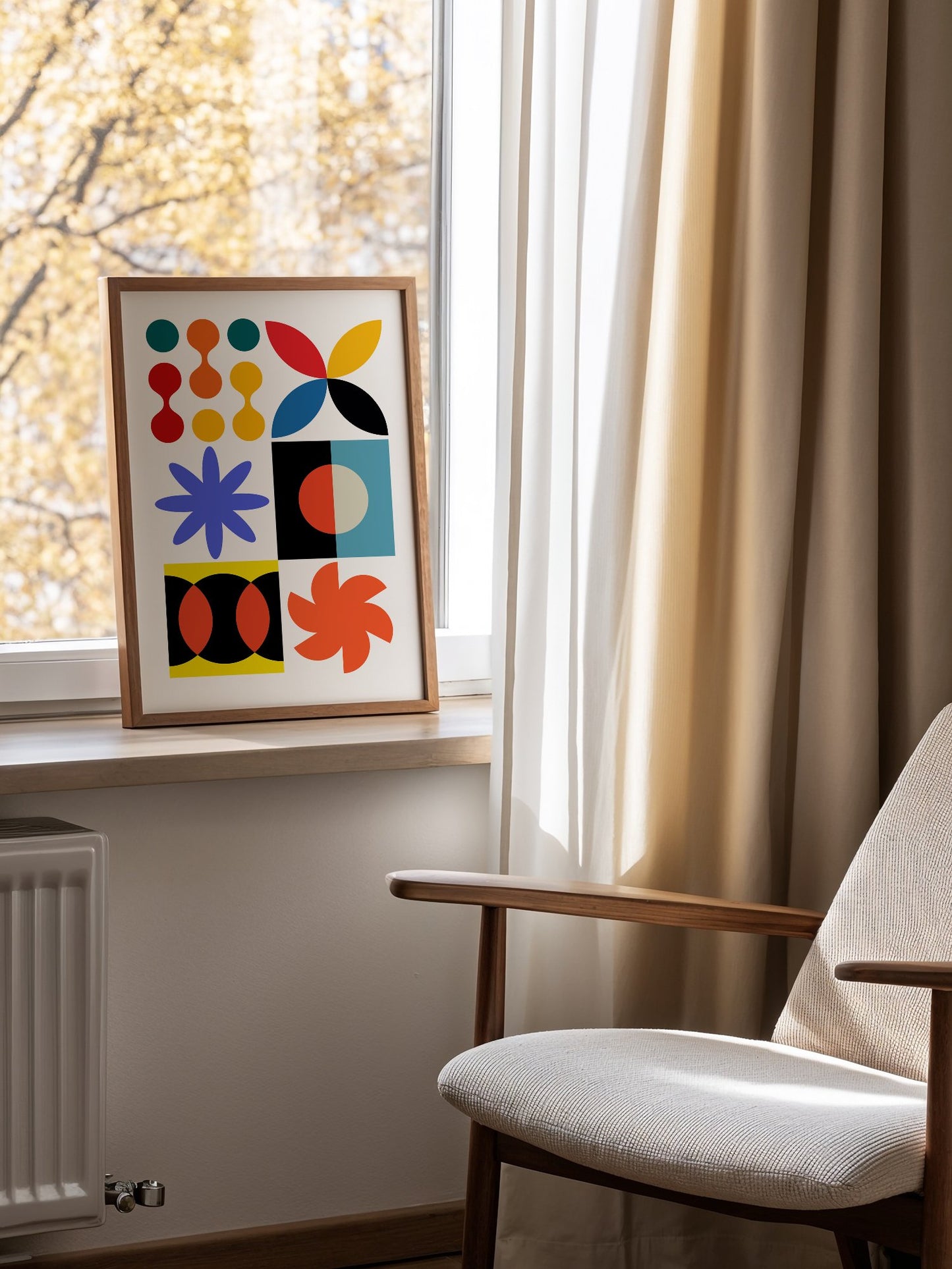 Colourful geometric abstract art print with starbursts, circles and shapes in, mounted in bright gallery wall arrangement