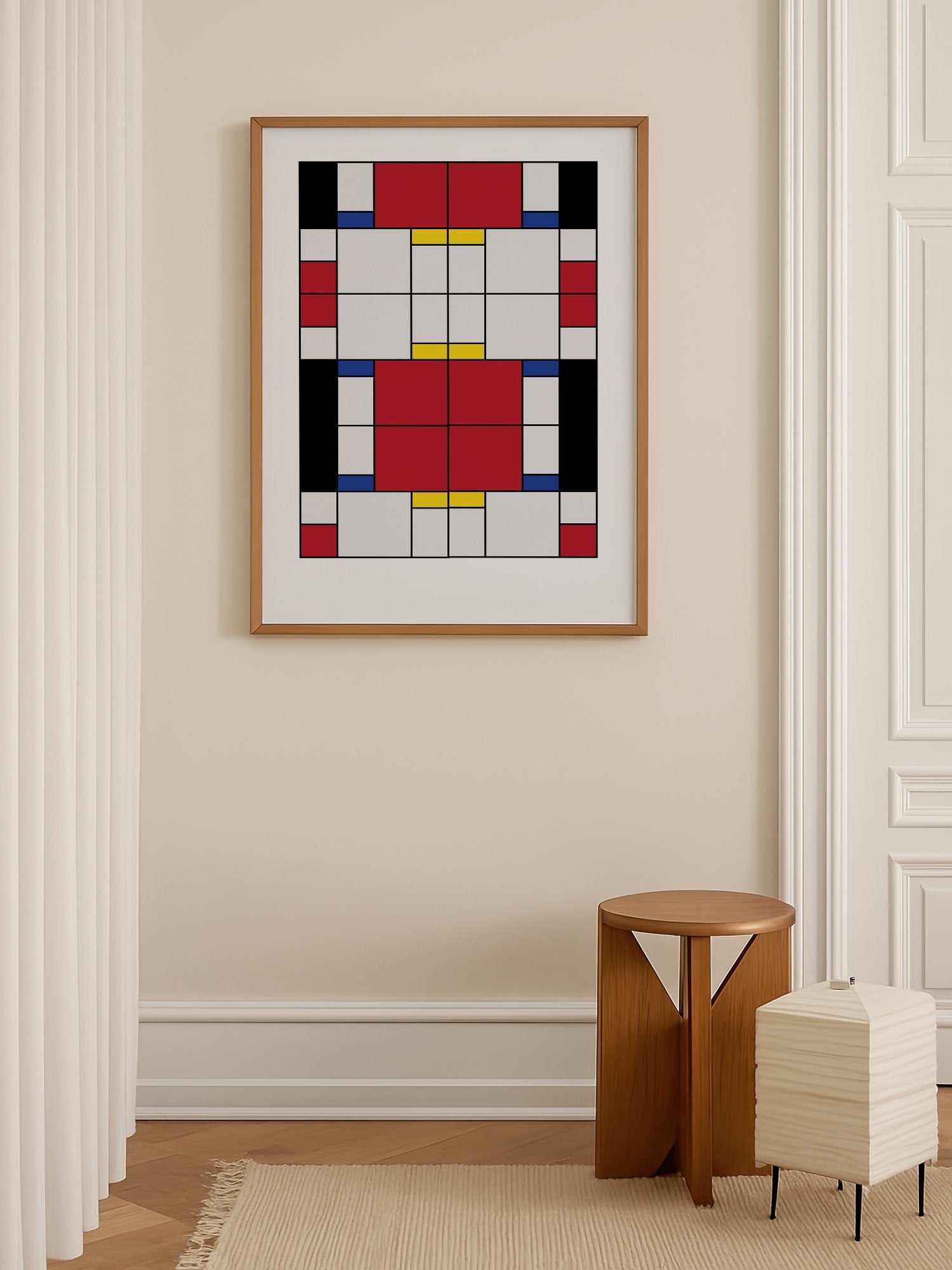 Bauhaus geometric abstract art print with red white and blue rectangular blocks, shown in minimalist home office space