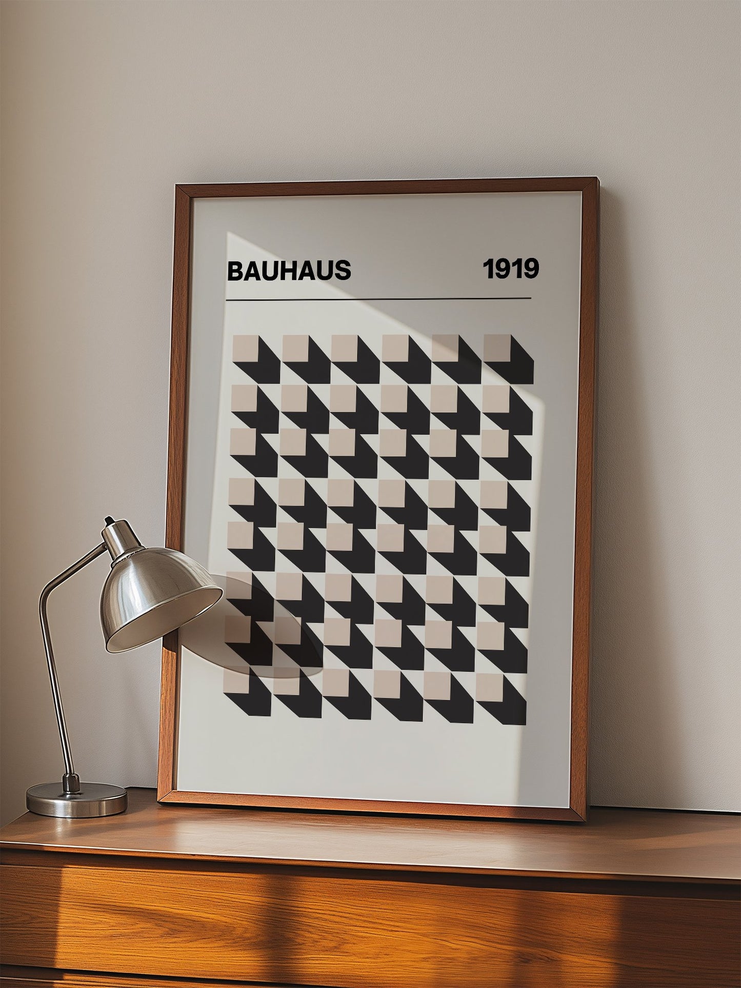 Bauhaus 1919 poster featuring grid of black and beige isometric cubes in, displayed in modern living room setting