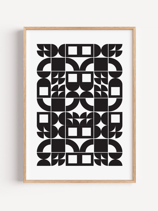 Bauhaus geometric wall art print featuring black and white modular grid pattern, close-up showing print texture and color ...