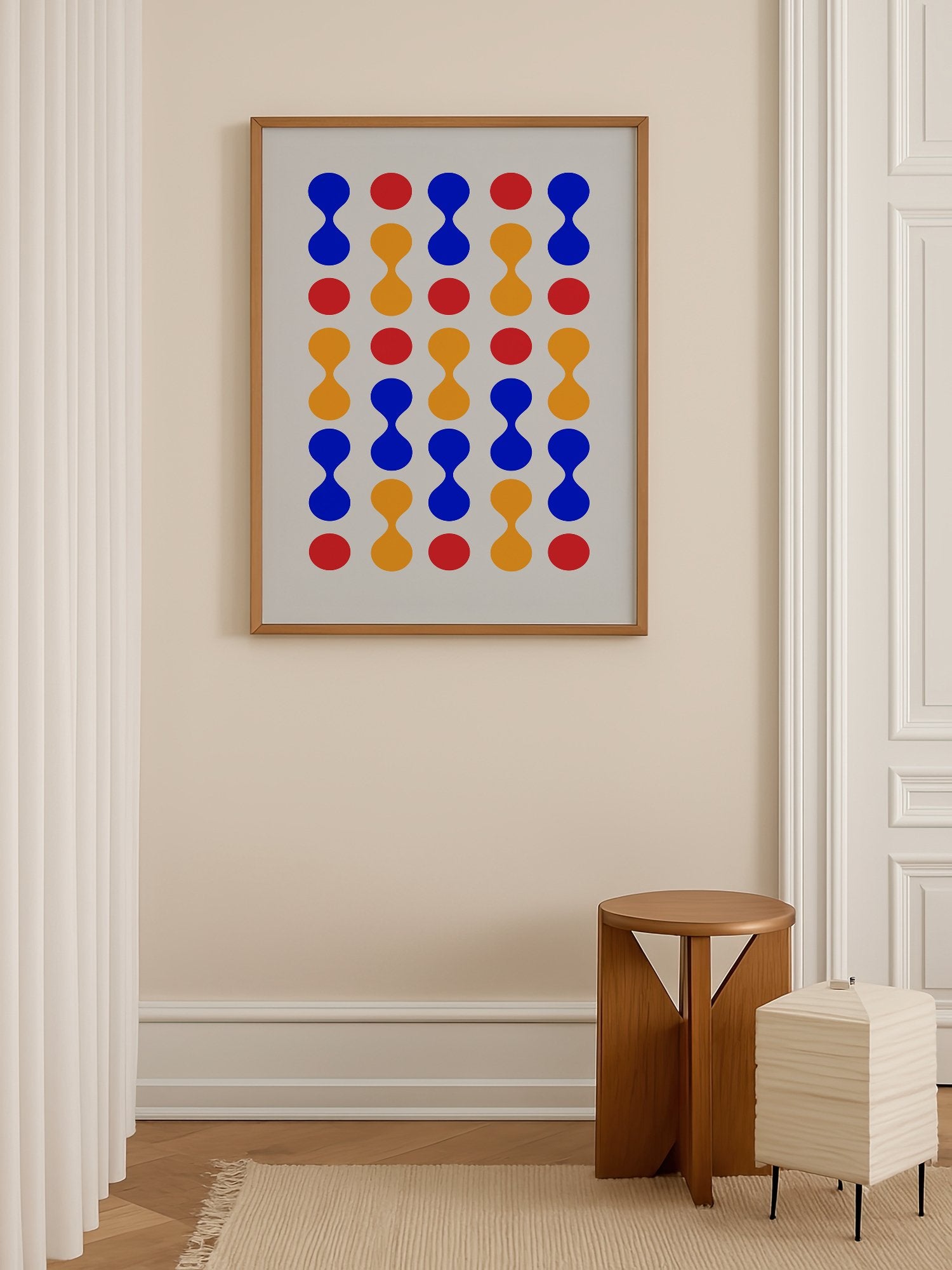 Bauhaus geometric wall art print featuring blue hourglass shapes and red orange, shown in minimalist home office space