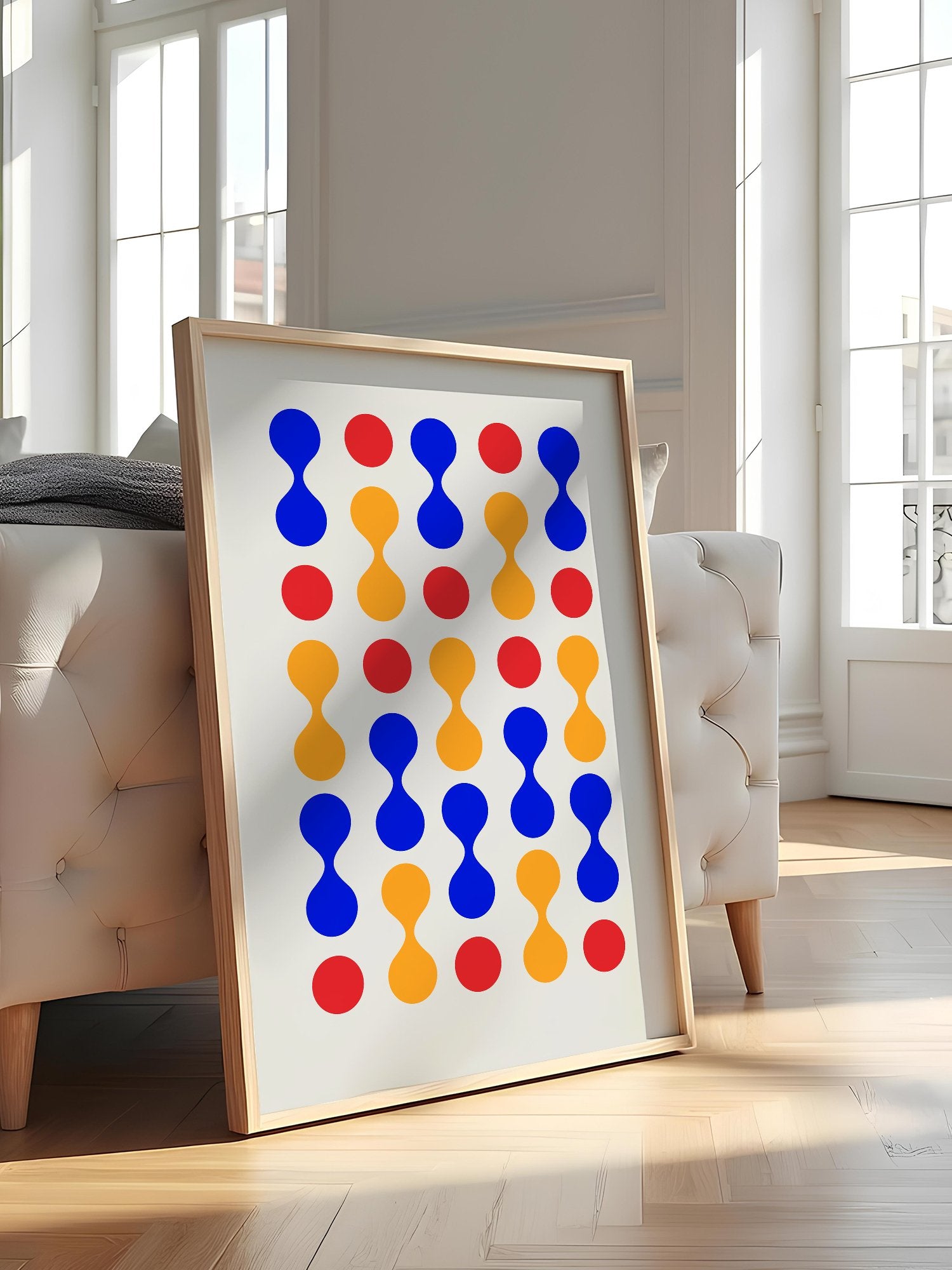 Bauhaus geometric wall art print featuring blue hourglass shapes and red orange, featured in stylish apartment decor