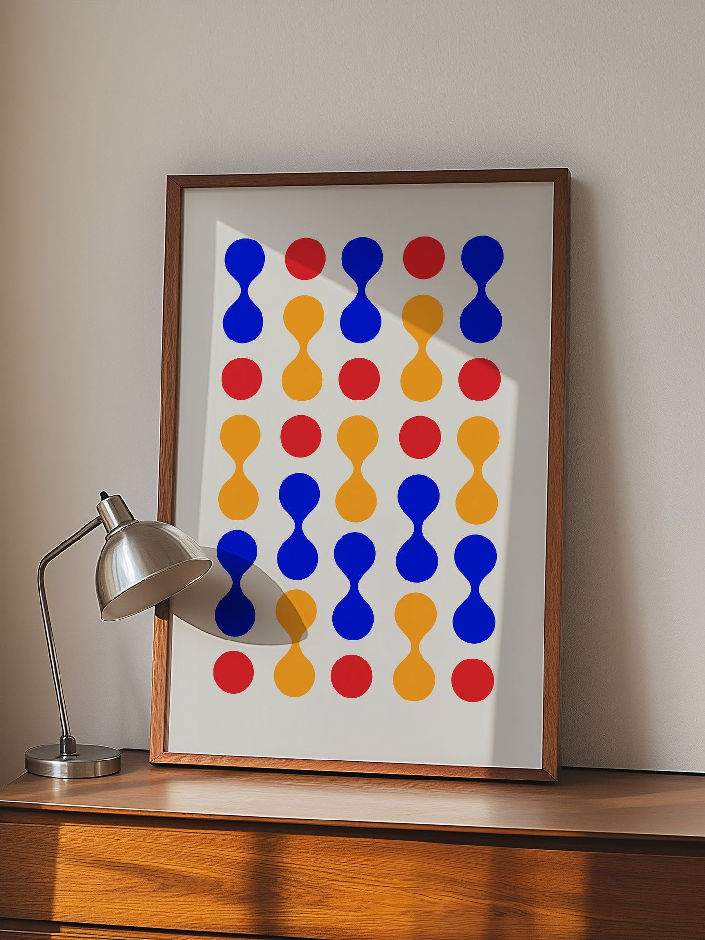 Bauhaus geometric wall art print featuring blue hourglass shapes and red orange, displayed in modern living room setting