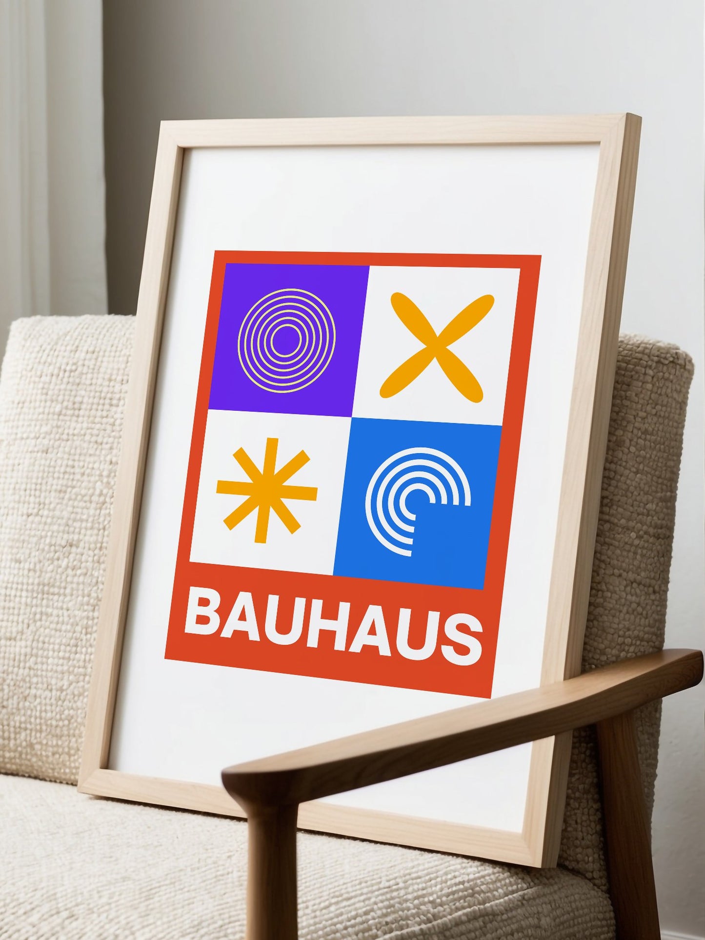 Bauhaus poster with geometric grid design featuring concentric circles, displayed in modern living room setting