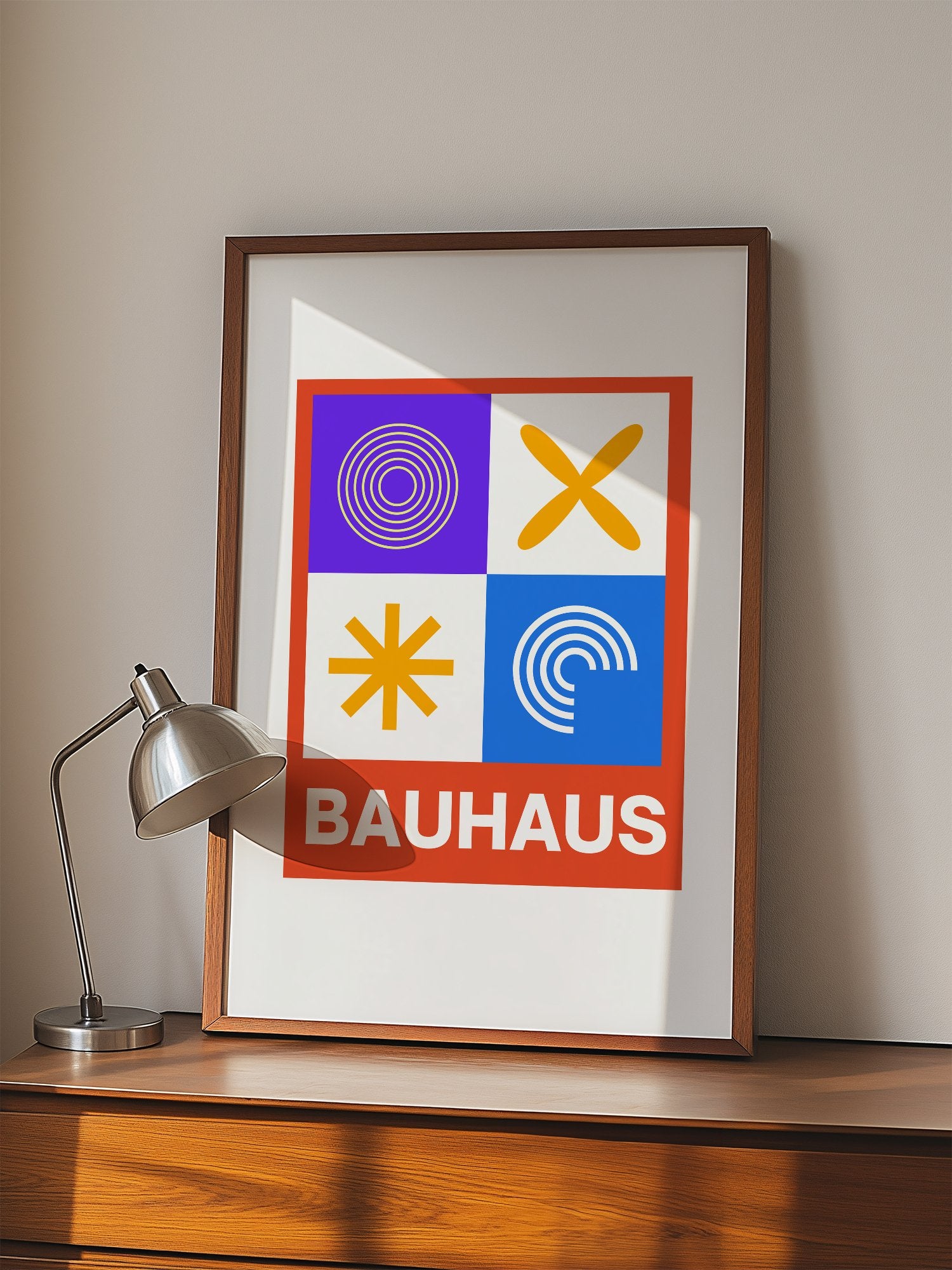 Bauhaus poster with geometric grid design featuring concentric circles, displayed in modern living room setting