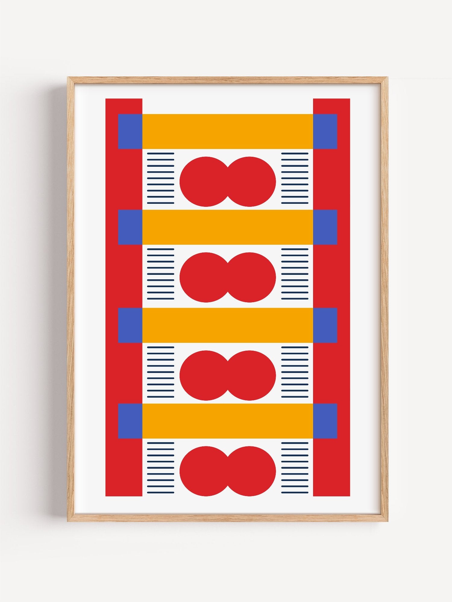 Bauhaus geometric wall art with red infinity symbols, yellow bands, and blue, close-up showing print texture and color detail
