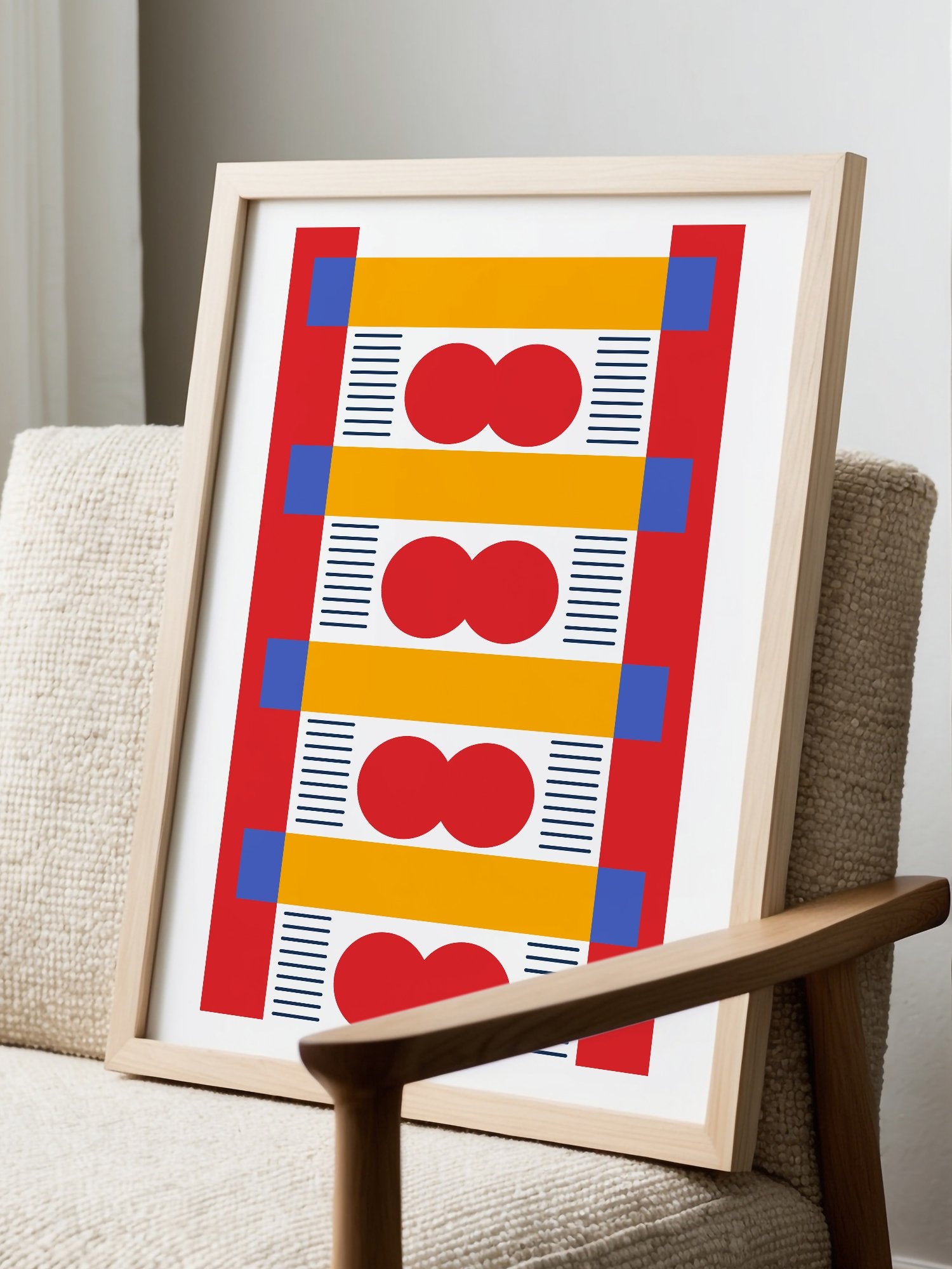Bauhaus geometric wall art with red infinity symbols, yellow bands, and blue, displayed in modern living room setting