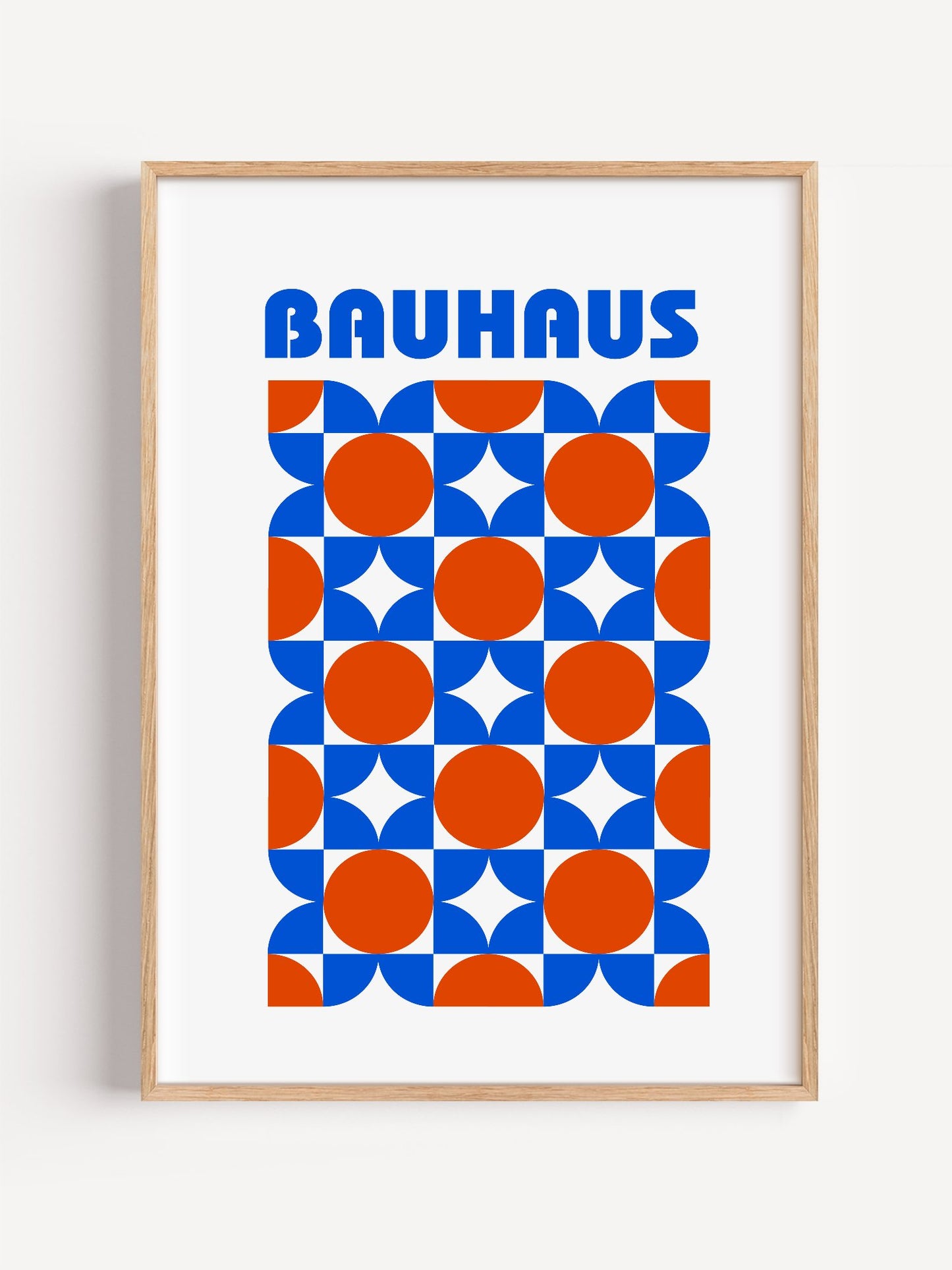 Bauhaus geometric poster with blue and orange quarter-circles in symmetrical, close-up showing print texture and color detail