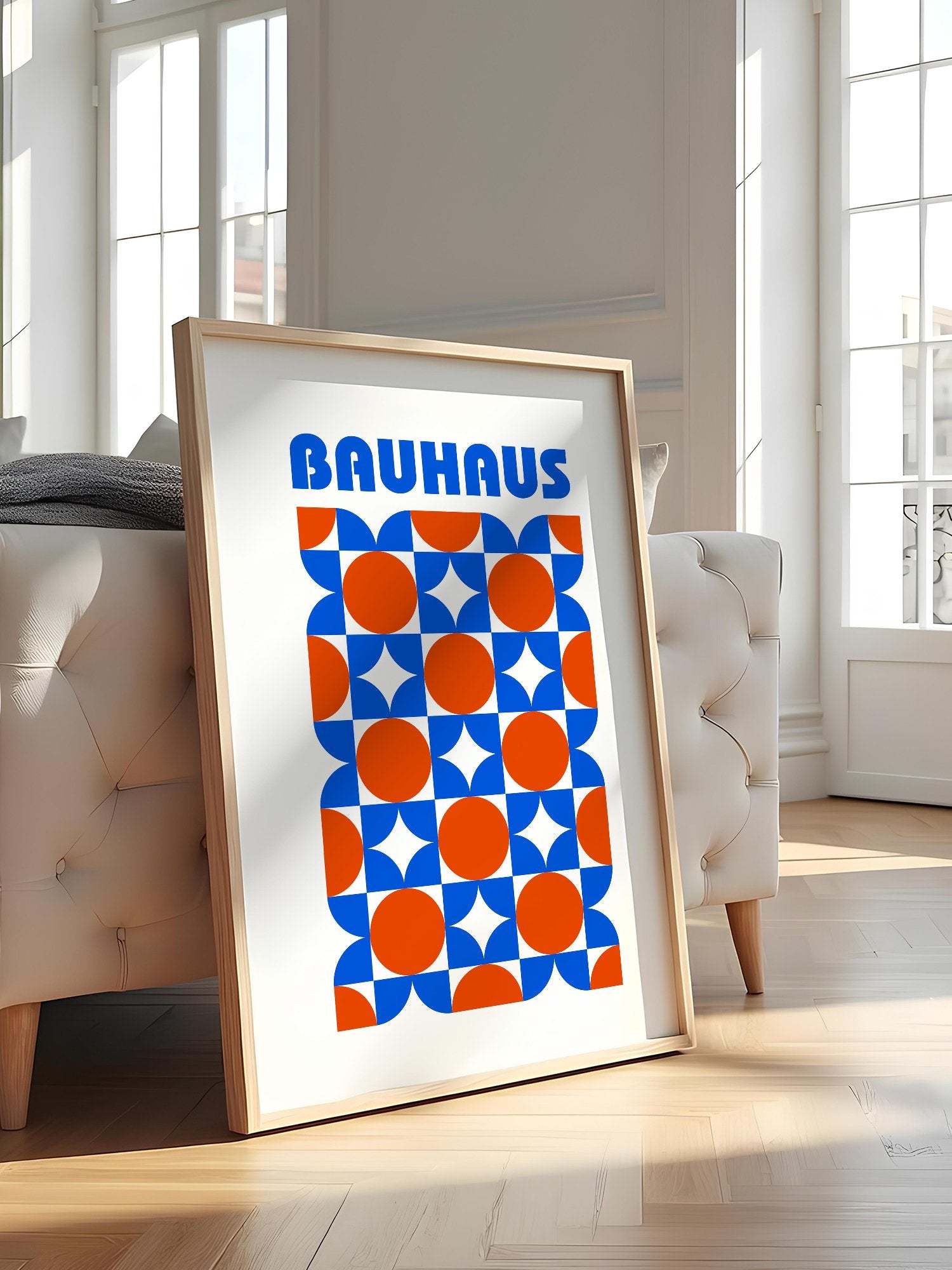 Bauhaus geometric poster with blue and orange quarter-circles in symmetrical, featured in stylish apartment decor