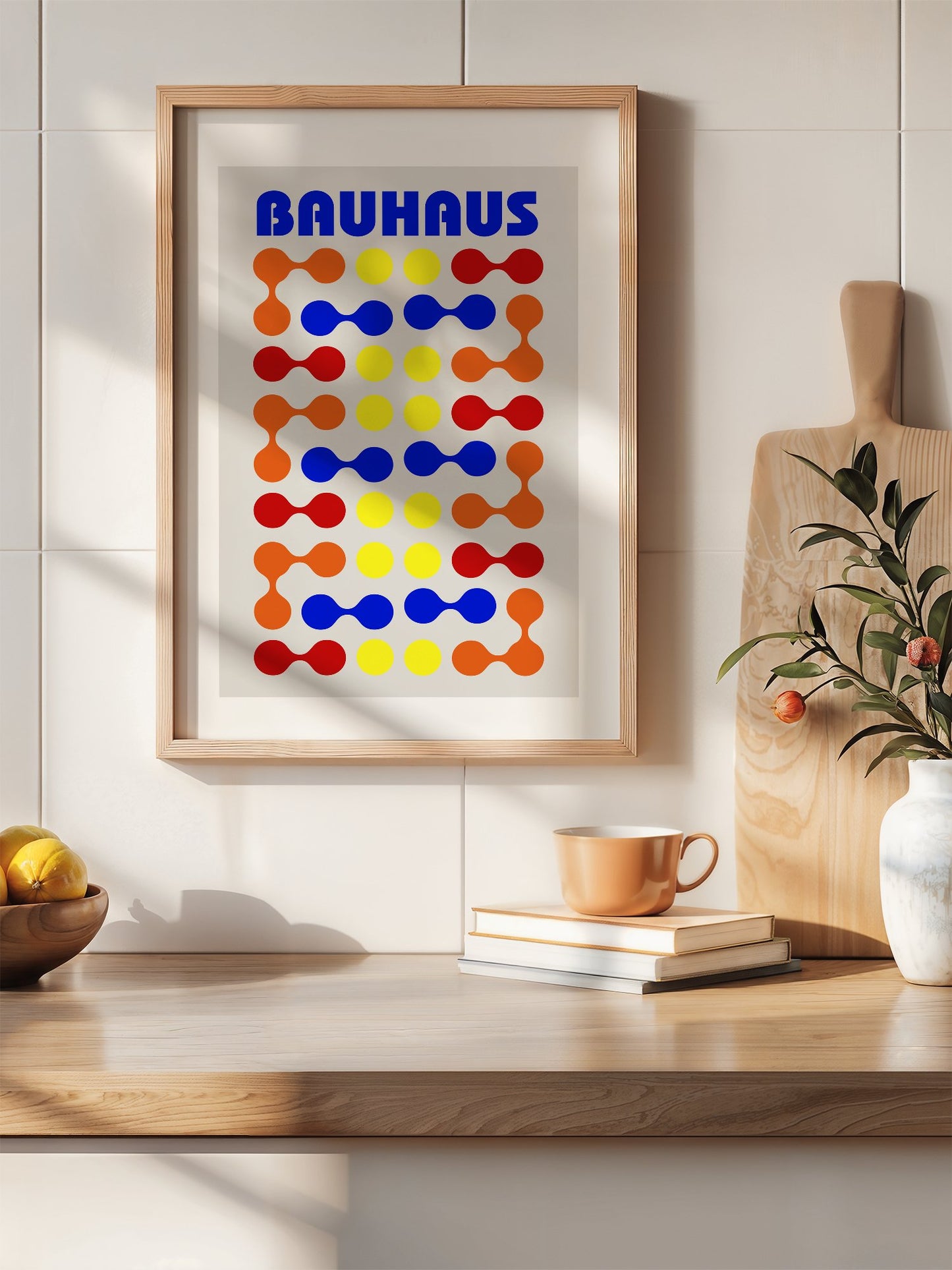 Bauhaus poster with bold blue typography and geometric grid pattern of circles, hanging in contemporary bedroom interior