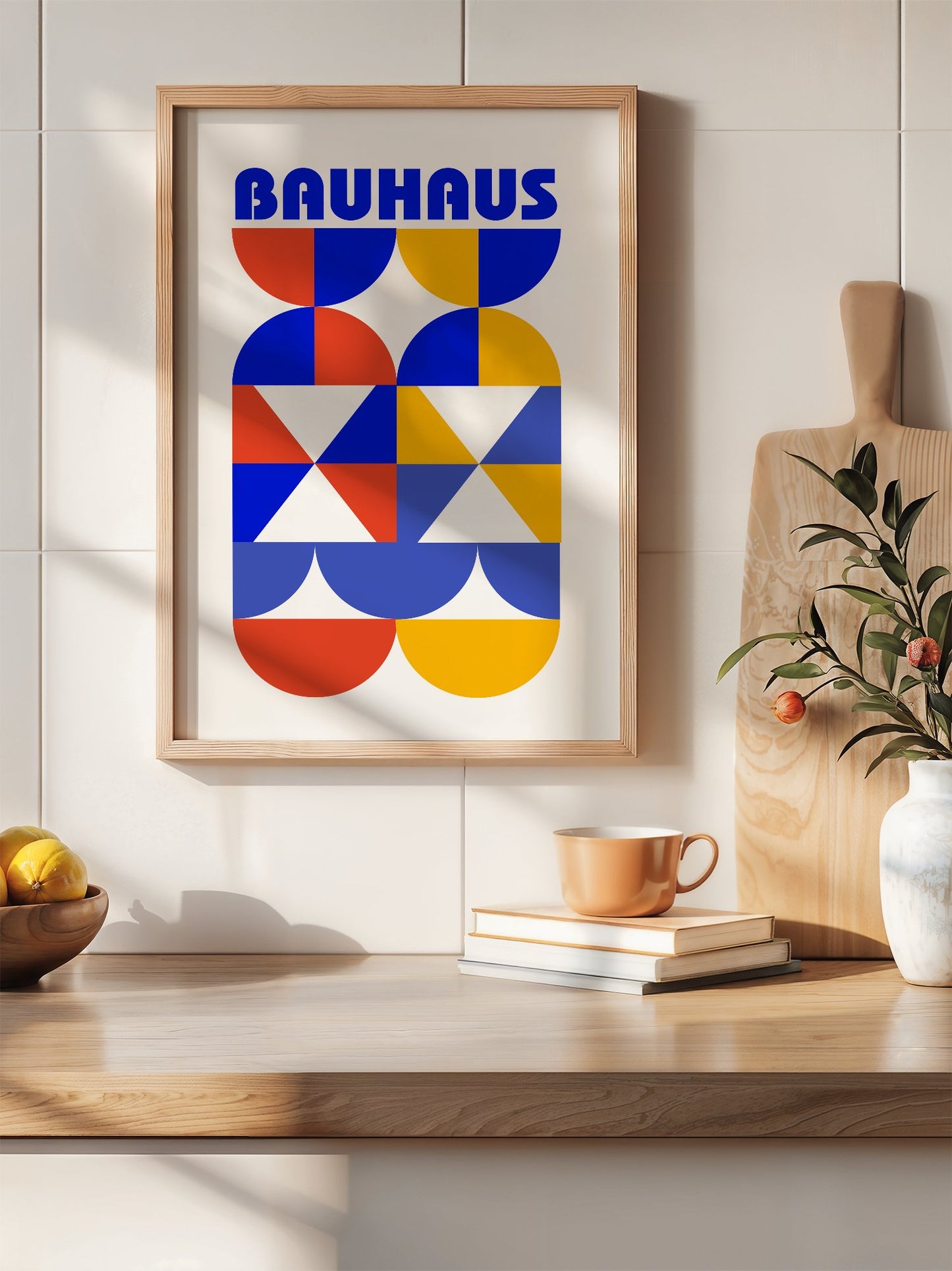Bauhaus geometric poster featuring bold blue typography above symmetrical, hanging in contemporary bedroom interior