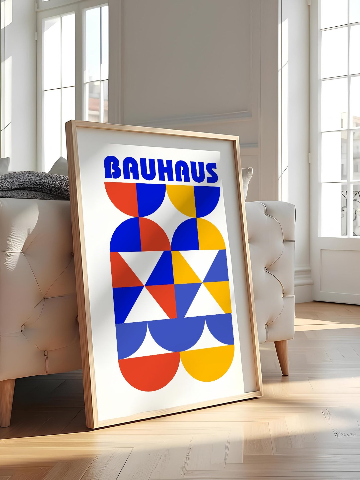 Bauhaus geometric poster featuring bold blue typography above symmetrical, featured in stylish apartment decor