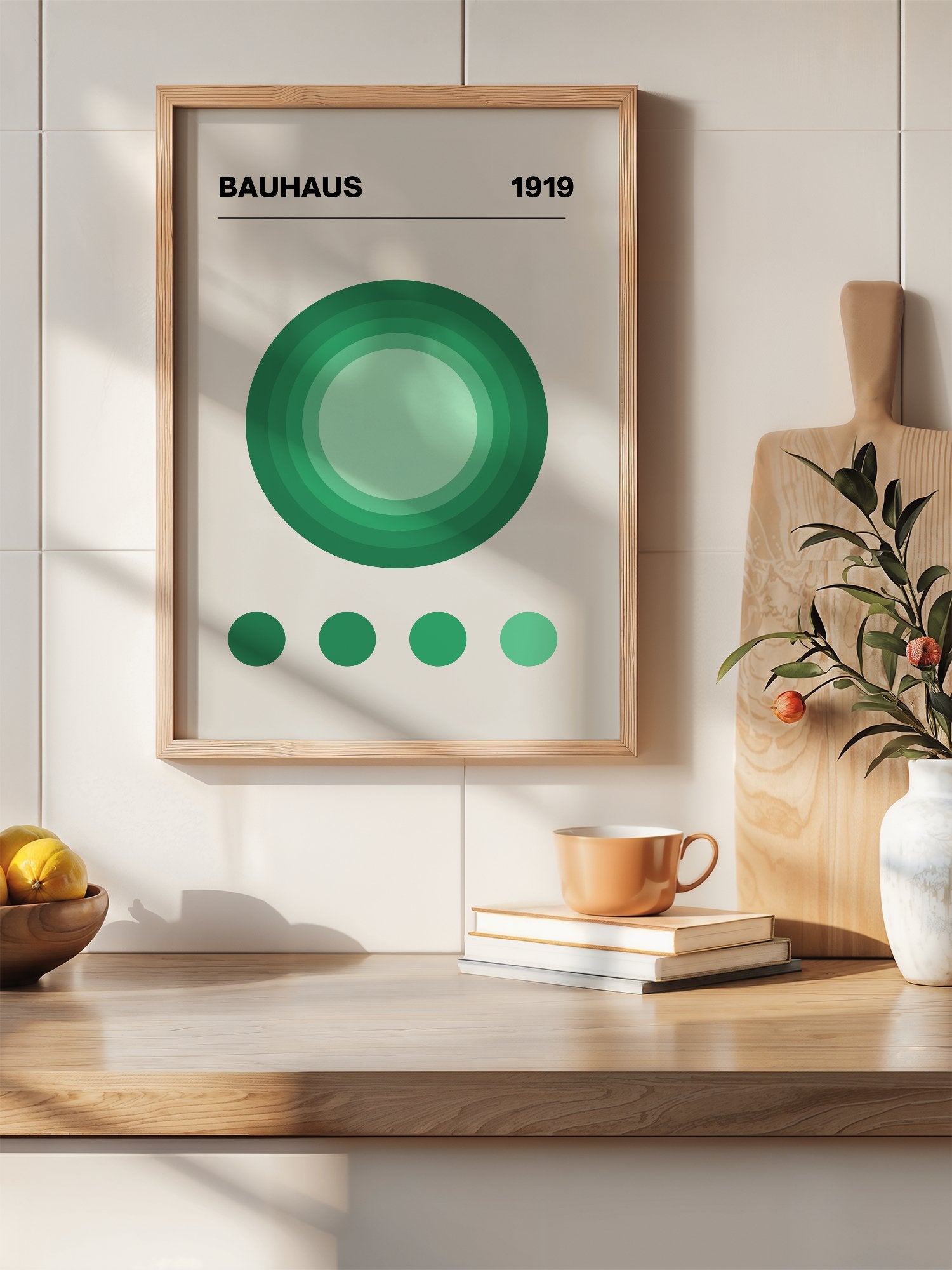 Bauhaus 1919 poster with concentric green circles in gradient shades on beige, hanging in contemporary bedroom interior