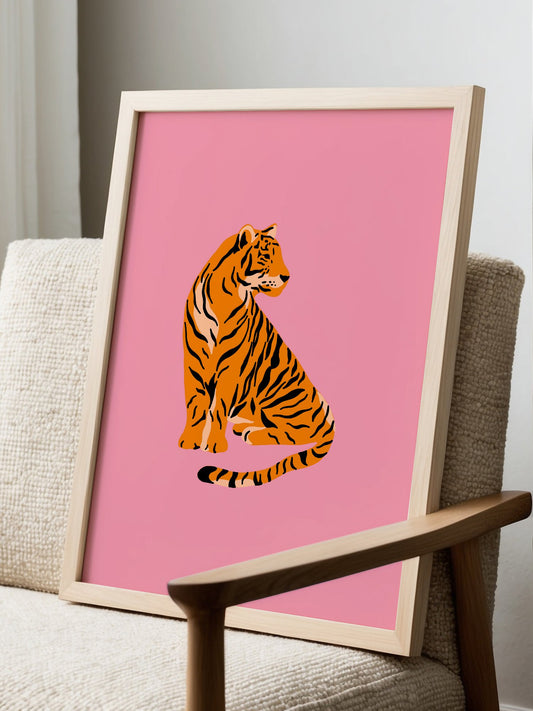 Bengal tiger illustration in orange and gold tones seated against vibrant pink, displayed in modern living room setting