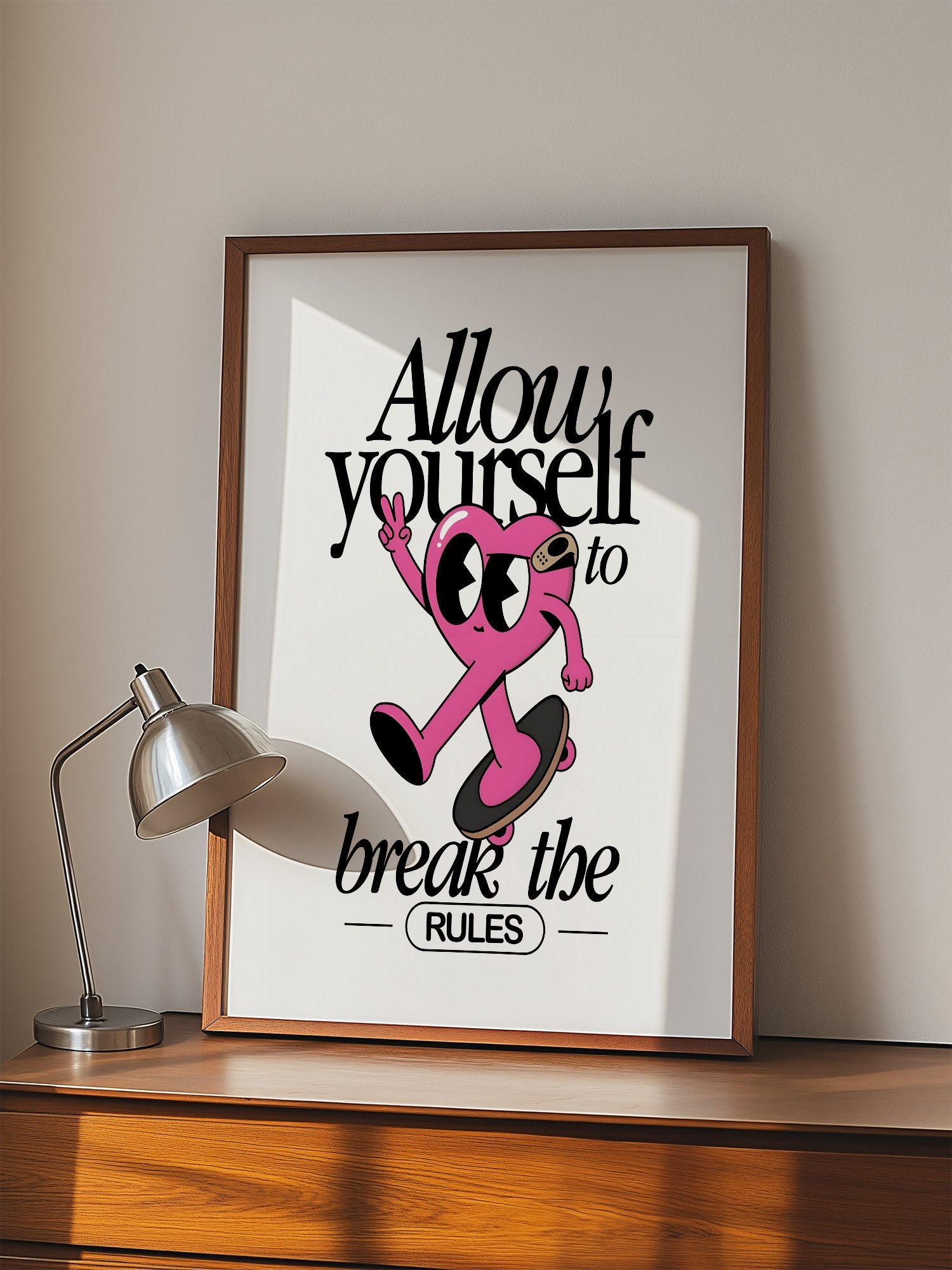 Pink heart character skateboarding with peace sign, break the rules, displayed in modern living room setting