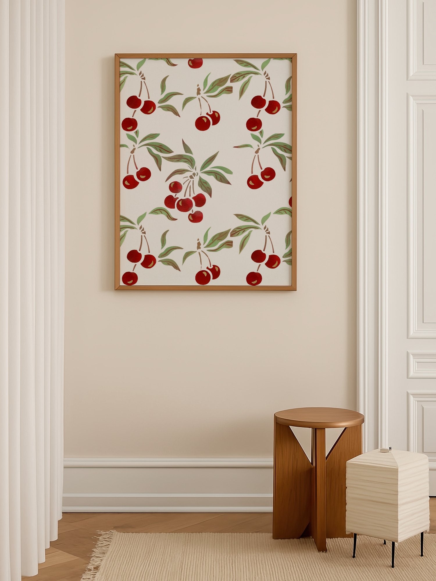 Repeating cherry botanical pattern with red fruit clusters and green leaves on, shown in minimalist home office space