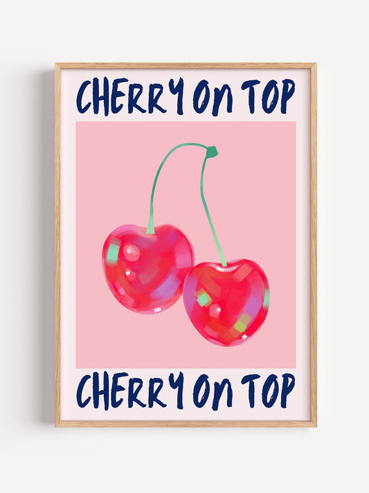 Cherry illustration print featuring two glossy red cherries on pink background, close-up showing print texture and color d...