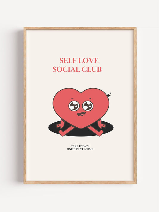 Cute pink heart character wall art with 'Self Love Social Club' text, close-up showing print texture and color detail